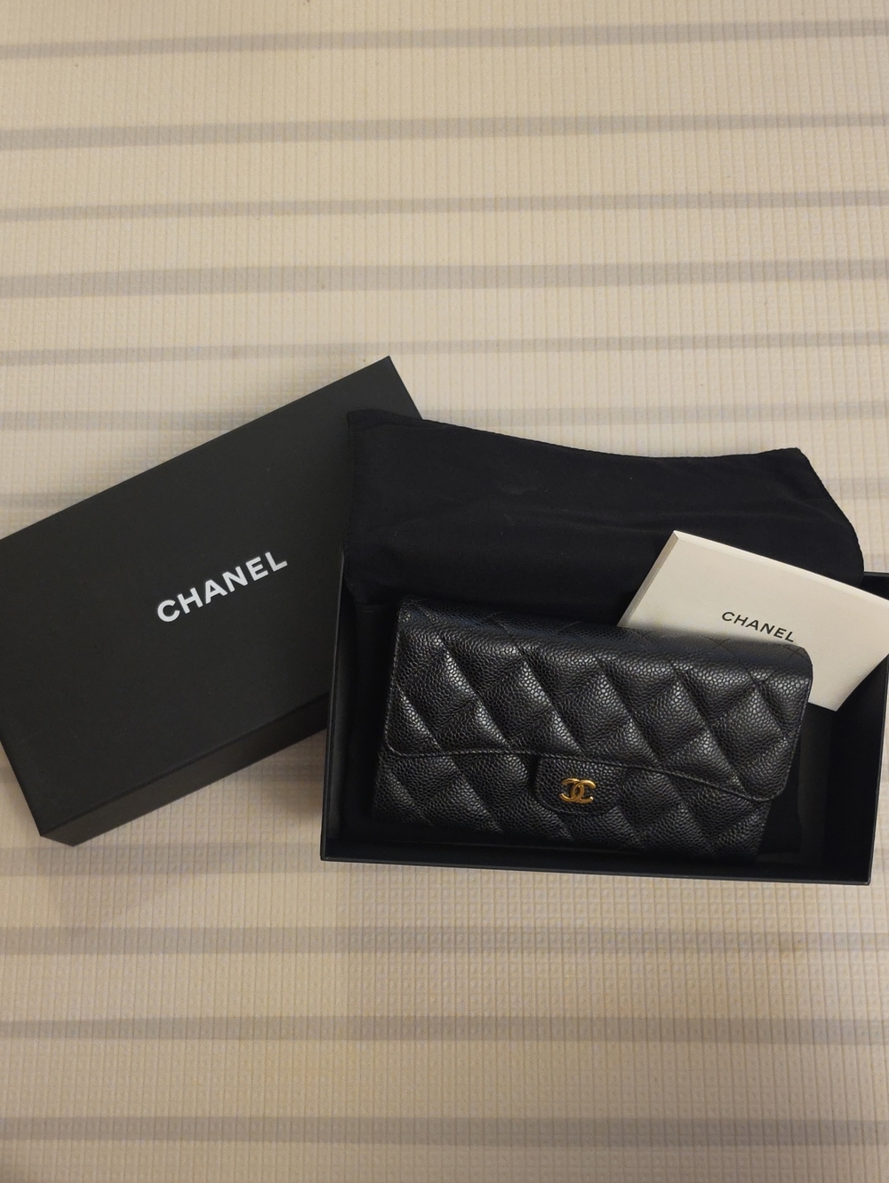Authentic CHANEL Black Quilted Caviar Leather Wallet with Gold CC